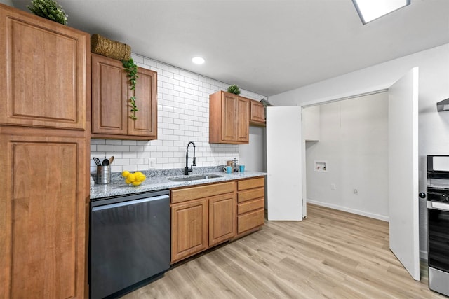 1830 San Antonio St, Grand Prairie, TX 75051 - kitchen featuring dishwashing machine, light stone countertops, decorative backsplash, light wood-type flooring, and recessed lighting