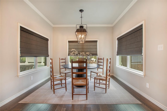 712 Tallgrass Dr, Aledo, TX 76008 - dining area featuring plenty of natural light, ornamental molding, and wood finished floors