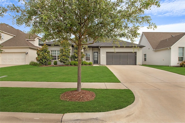 712 Tallgrass Dr, Aledo, TX 76008 - view of front of home featuring an attached garage, concrete driveway, and a front yard
