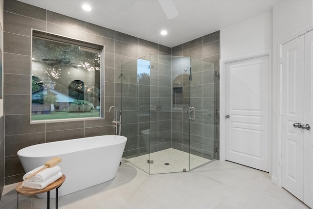 2800 Broadacres Ln, Dalworthington Gardens, TX 76016 - full bath featuring a shower stall, a freestanding tub, tile walls, recessed lighting, and tile patterned floors