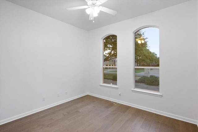 2800 Broadacres Ln, Dalworthington Gardens, TX 76016 - empty room with wood finished floors and a ceiling fan