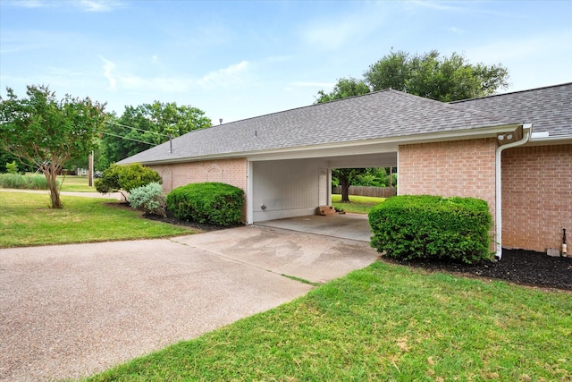 2800 Broadacres Ln, Dalworthington Gardens, TX 76016 - view of side of property with roof with shingles, brick siding, concrete driveway, and a yard