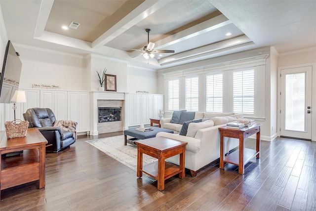 306 Creekview Ter, Aledo, TX 76008 - living area featuring ceiling fan, a high end fireplace, dark wood-style floors, ornamental molding, and a tray ceiling