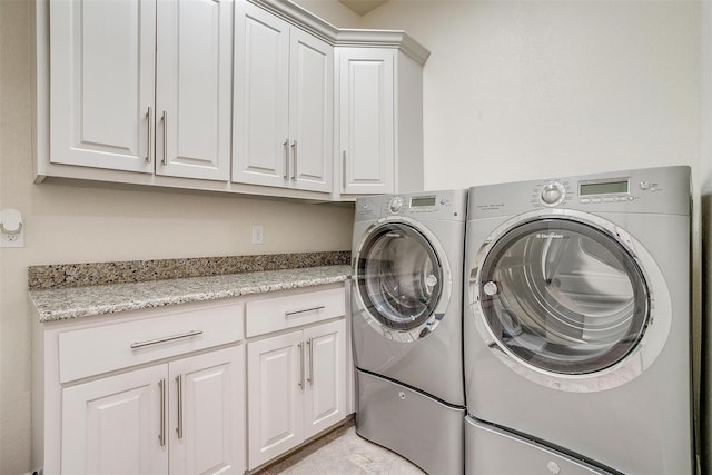 306 Creekview Ter, Aledo, TX 76008 - laundry room featuring cabinet space and independent washer and dryer
