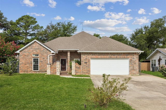 307 Ada St, Irving, TX 75061 - view of front of home with concrete driveway, an attached garage, roof with shingles, and brick siding