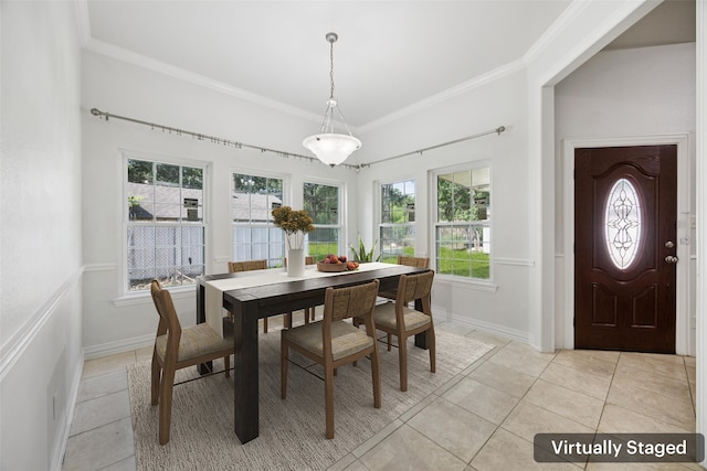 307 Ada St, Irving, TX 75061 - dining room with light tile patterned floors, ornamental molding, and healthy amount of natural light