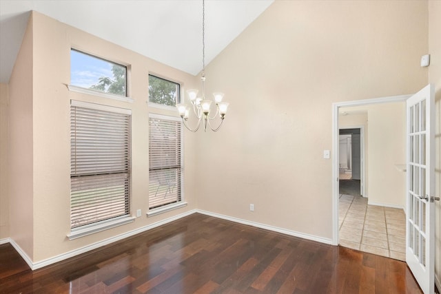 4056 La Costa Ct, Irving, TX 75038 - unfurnished dining area featuring high vaulted ceiling, a chandelier, and wood finished floors