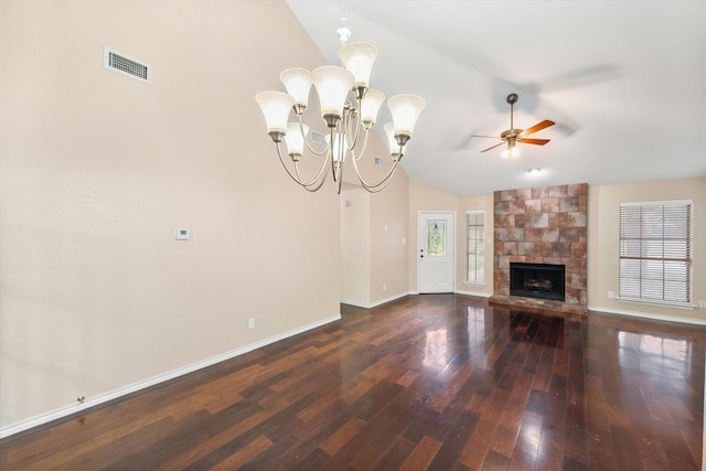 4056 La Costa Ct, Irving, TX 75038 - unfurnished living room featuring lofted ceiling, wood-type flooring, a ceiling fan, a fireplace, and a chandelier