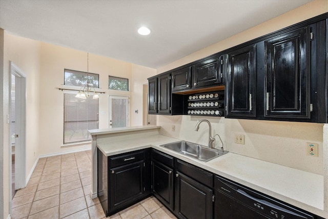 4056 La Costa Ct, Irving, TX 75038 - kitchen with dark cabinetry, black dishwasher, light countertops, light tile patterned flooring, and recessed lighting