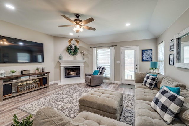 1289 Lasso Dr, Little Elm, TX 75068 - living area with ceiling fan, wood finished floors, a fireplace, and recessed lighting