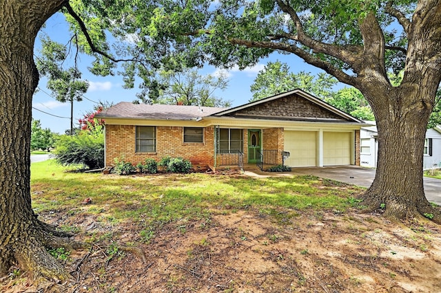 1402 Hillcrrest Dr, Sherman, TX 75092 - ranch-style house with a garage, brick siding, concrete driveway, and a porch