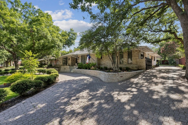 1605 Canyon Oaks Dr, Irving, TX 75061 - view of front of home with brick siding