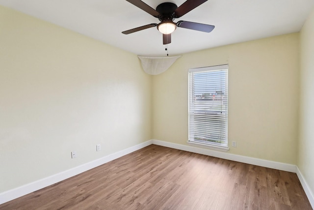 5601 Trego St, The Colony, TX 75056 - unfurnished room featuring wood finished floors and ceiling fan