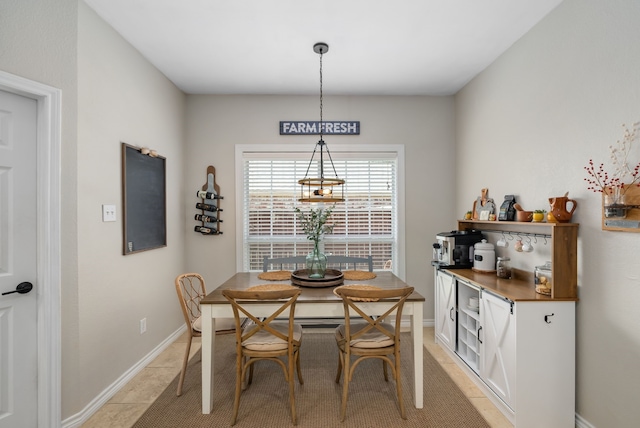 8571 Hidden Spring Dr, Frisco, TX 75034 - dining area with light tile patterned flooring and a dry bar