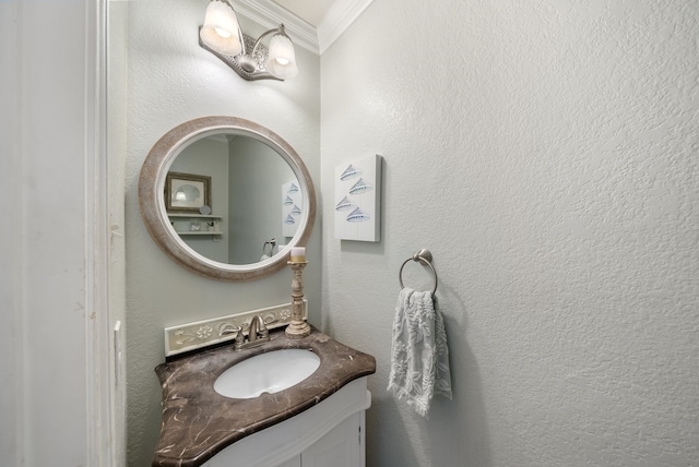 8571 Hidden Spring Dr, Frisco, TX 75034 - bathroom featuring ornamental molding and vanity
