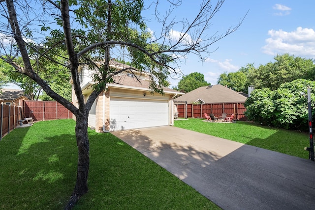 8571 Hidden Spring Dr, Frisco, TX 75034 - view of yard featuring a garage