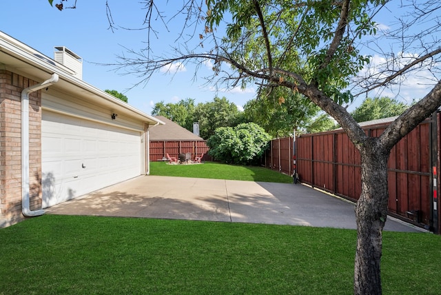 8571 Hidden Spring Dr, Frisco, TX 75034 - fenced backyard with a garage