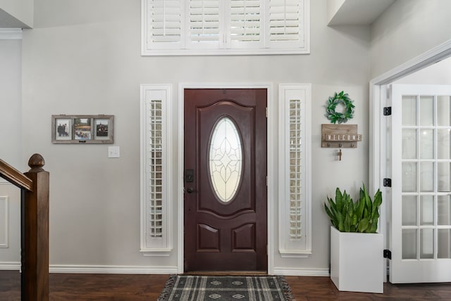 8571 Hidden Spring Dr, Frisco, TX 75034 - entryway featuring wood finished floors and a towering ceiling