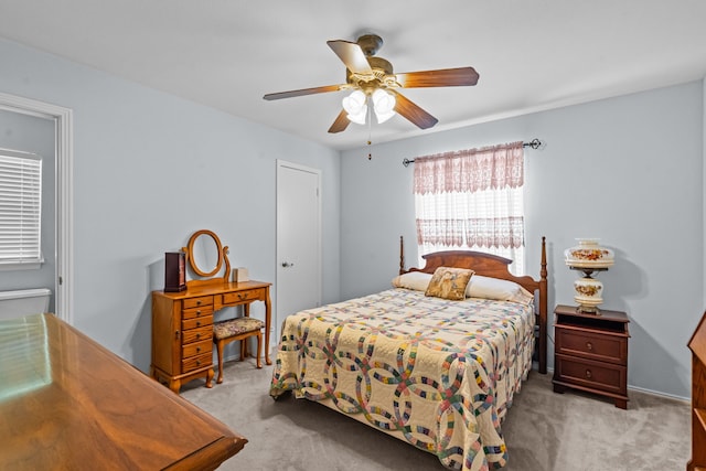 2912 Marsann Ln, Farmers Branch, TX 75234 - bedroom featuring light colored carpet and ceiling fan