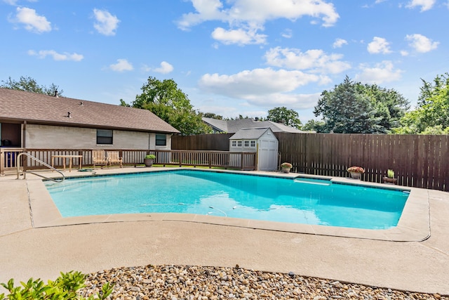 2912 Marsann Ln, Farmers Branch, TX 75234 - view of pool featuring a fenced backyard and a shed