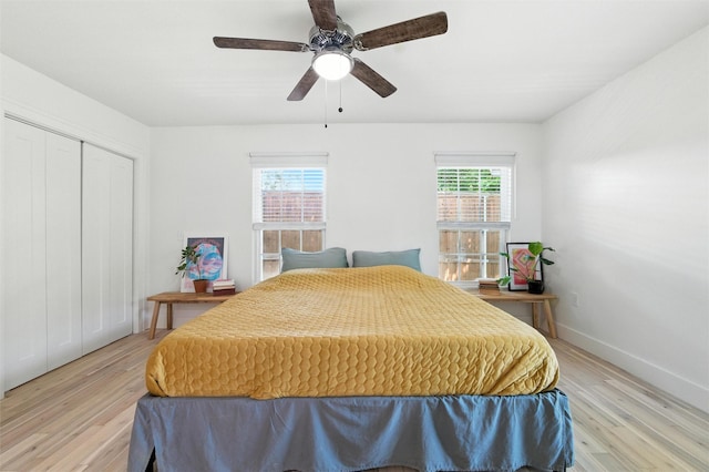3056 Valley View Ln, Farmers Branch, TX 75234 - bedroom featuring light wood finished floors, ceiling fan, and a closet