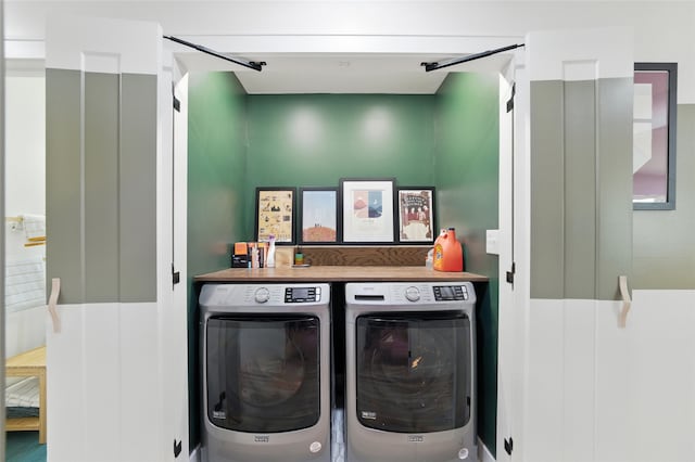 3056 Valley View Ln, Farmers Branch, TX 75234 - washroom with washer and dryer