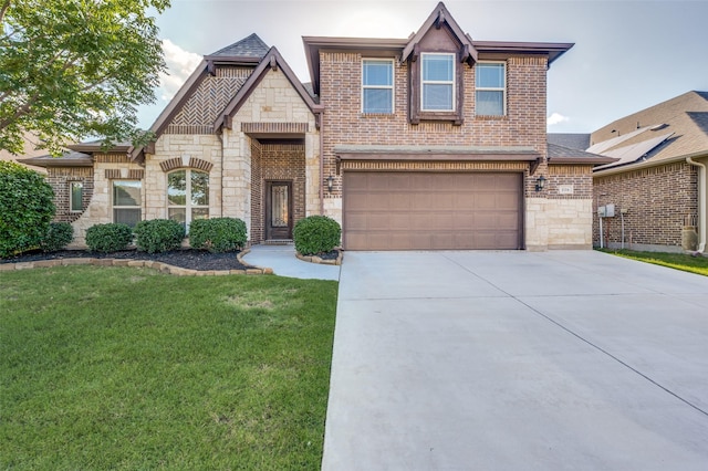 1116 Broken Wheel Trl, Aubrey, TX 76227 - view of front facade featuring stone siding, an attached garage, driveway, and a front yard