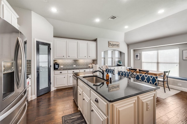 1116 Broken Wheel Trl, Aubrey, TX 76227 - kitchen with stainless steel appliances, dark wood-style floors, healthy amount of natural light, a kitchen island with sink, and recessed lighting