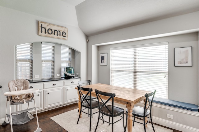 1116 Broken Wheel Trl, Aubrey, TX 76227 - dining area featuring dark wood finished floors and vaulted ceiling