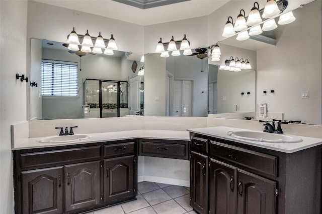 8813 Greenwood Trl, Rowlett, TX 75088 - bathroom with tile patterned floors, a stall shower, and double vanity