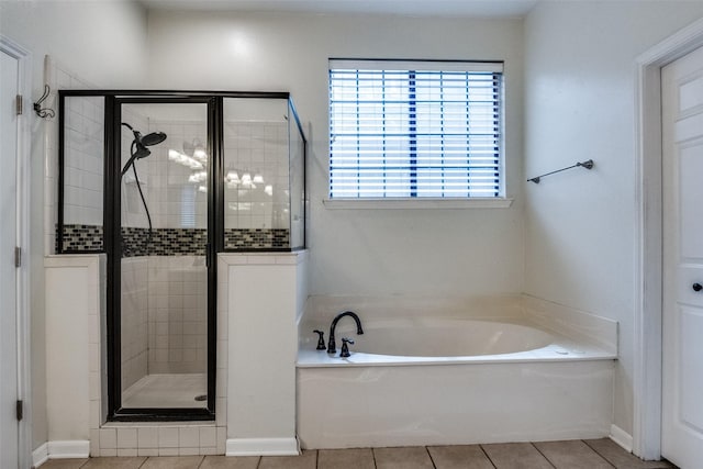8813 Greenwood Trl, Rowlett, TX 75088 - full bath with a bath, tile patterned flooring, and a stall shower