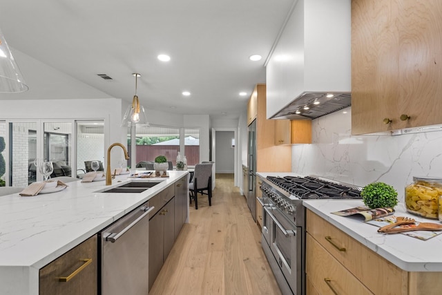 4408 Thunder Rd, Dallas, TX 75244 - kitchen with appliances with stainless steel finishes, custom exhaust hood, modern cabinets, light wood finished floors, and tasteful backsplash