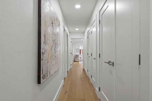 4408 Thunder Rd, Dallas, TX 75244 - hallway with recessed lighting and light wood finished floors