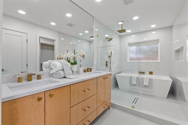 4408 Thunder Rd, Dallas, TX 75244 - bathroom featuring a shower stall, double vanity, a freestanding tub, and recessed lighting