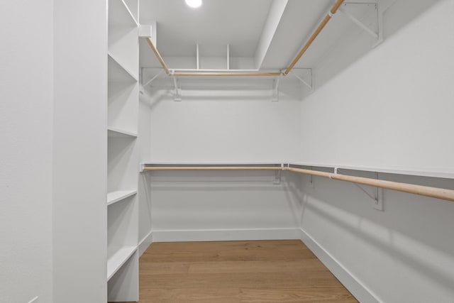 4408 Thunder Rd, Dallas, TX 75244 - walk in closet with wood finished floors