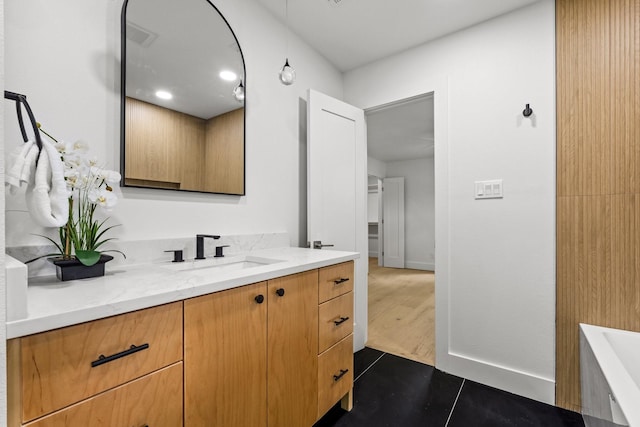 4408 Thunder Rd, Dallas, TX 75244 - bathroom featuring vanity, a bathtub, and tile patterned floors