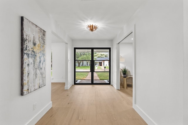 4408 Thunder Rd, Dallas, TX 75244 - hall featuring baseboards and light wood finished floors