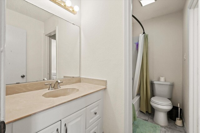 2210 Nantucket Village Cir, Dallas, TX 75227 - full bathroom featuring vanity, shower / tub combo, and tile patterned floors
