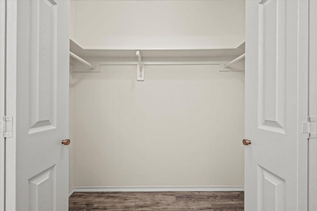 2210 Nantucket Village Cir, Dallas, TX 75227 - walk in closet with wood finished floors