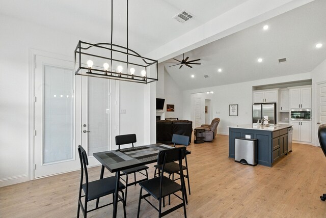 303 Highland Ct, Aledo, TX 76008 - dining room featuring a ceiling fan, light wood-style flooring, recessed lighting, a chandelier, and high vaulted ceiling