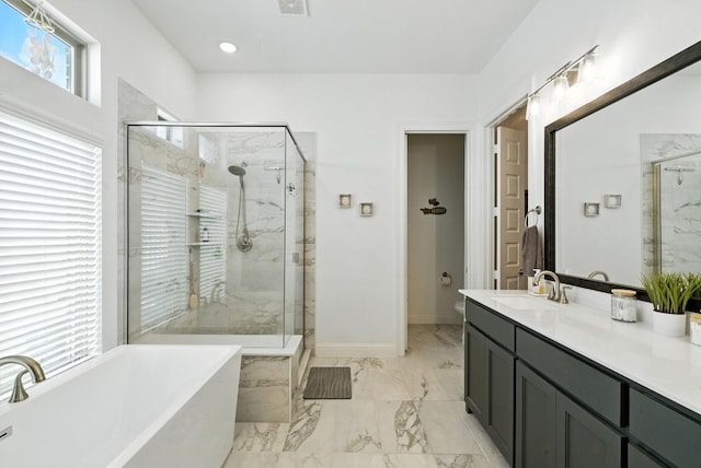 303 Highland Ct, Aledo, TX 76008 - full bath featuring a soaking tub, a marble finish shower, vanity, and marble finish flooring