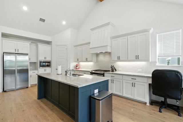 303 Highland Ct, Aledo, TX 76008 - kitchen with stainless steel appliances, high vaulted ceiling, white cabinetry, backsplash, and recessed lighting