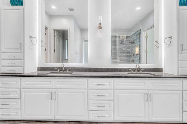 11334 Graceland Ln, Frisco, TX 75033 - bathroom with a stall shower and double vanity