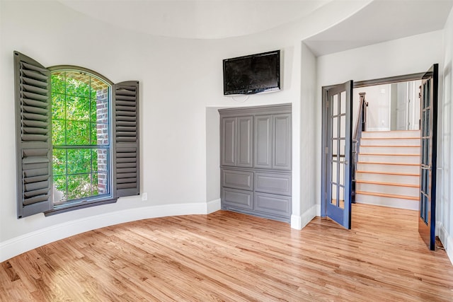 11334 Graceland Ln, Frisco, TX 75033 - unfurnished bedroom with baseboards and light wood-style floors