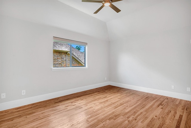 11334 Graceland Ln, Frisco, TX 75033 - empty room with wood finished floors, a ceiling fan, and vaulted ceiling