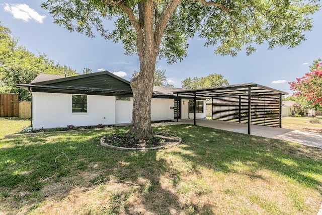 13516 Spring Grove Ave, Dallas, TX 75240 - view of front facade featuring brick siding and a carport