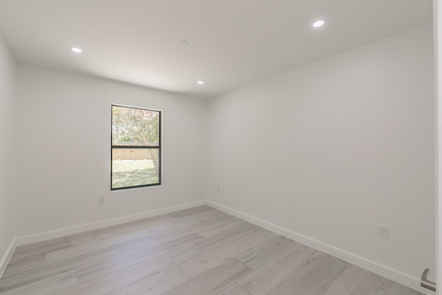 13516 Spring Grove Ave, Dallas, TX 75240 - empty room featuring recessed lighting and light wood finished floors
