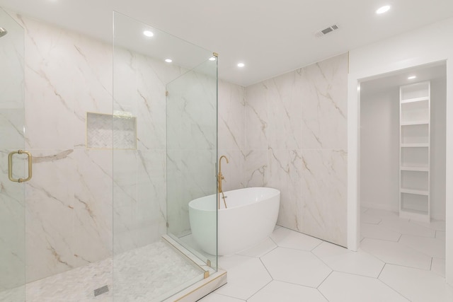 13516 Spring Grove Ave, Dallas, TX 75240 - full bath with tile walls, a marble finish shower, recessed lighting, and a soaking tub