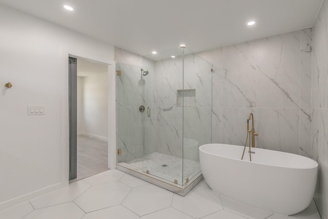13516 Spring Grove Ave, Dallas, TX 75240 - full bathroom with a freestanding tub, recessed lighting, a marble finish shower, and tile walls