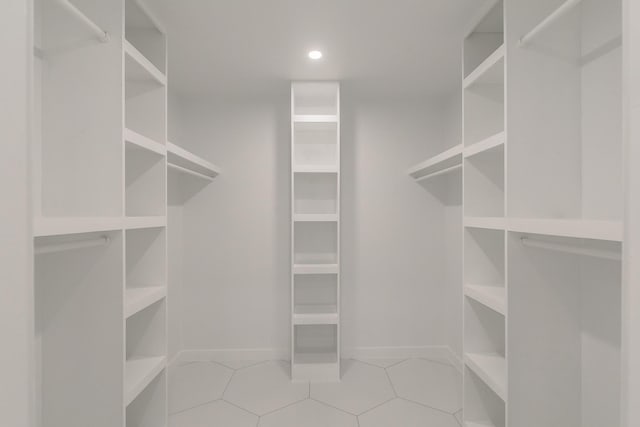 13516 Spring Grove Ave, Dallas, TX 75240 - spacious closet featuring light tile patterned flooring